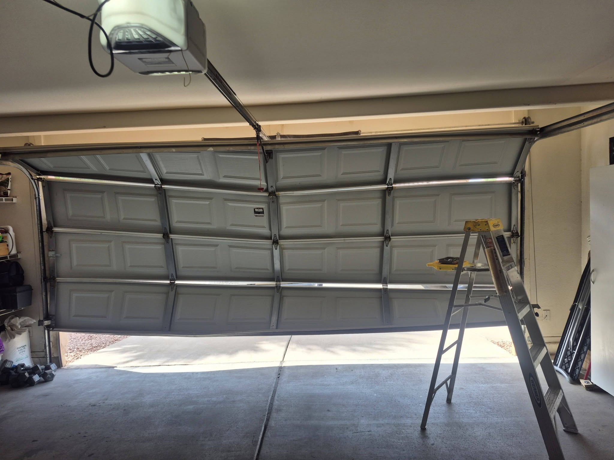 Residential garage door work in progress shared by J&B Garage Doors